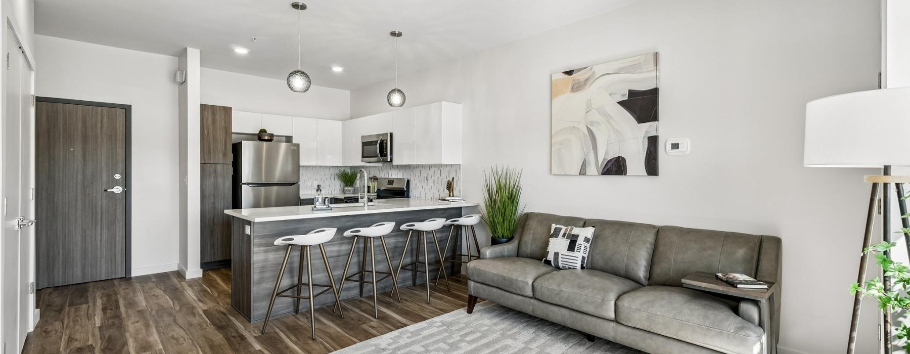 a living room with a couch and a table